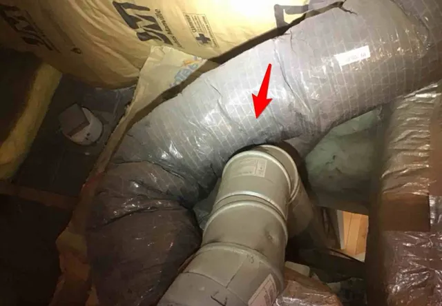Furnace flue too close to wood in the attic: photo 2 from a Chicago inspection report