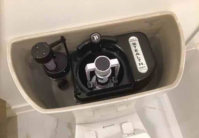 Toilet runs nonstop: photo 1 from a Chicago inspection report