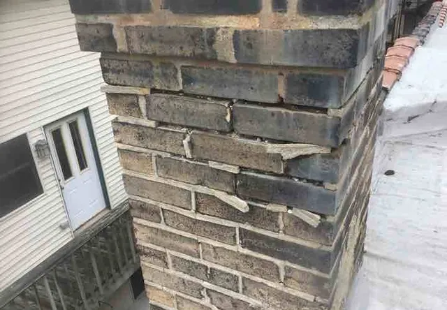 Chimney badly deteriorated: photo 1 from a Chicago inspection report