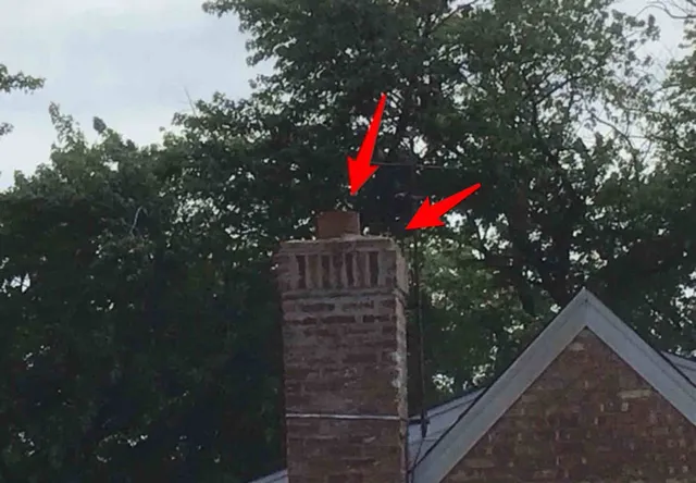 Chimney missing its caps, liner not verified: photo 1 from a Chicago inspection report