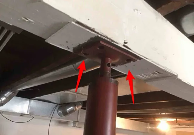 Beam posts not properly fastened or footed: photo 1 from a Chicago inspection report