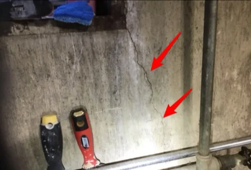 Cracks in a poured concrete foundation wall
