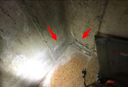 Cracks in a poured concrete foundation wall (photo 2)
