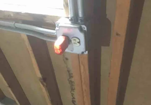 Garage outlets without GFCI protection: photo 1 from a Chicago inspection report