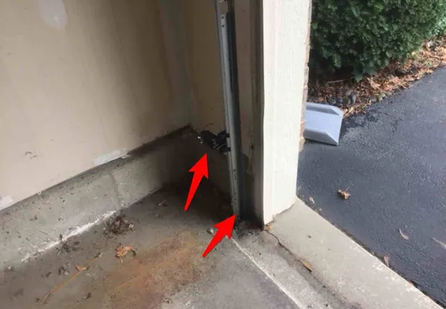 Garage door sensors mounted too high: photo 1 from a Chicago inspection report