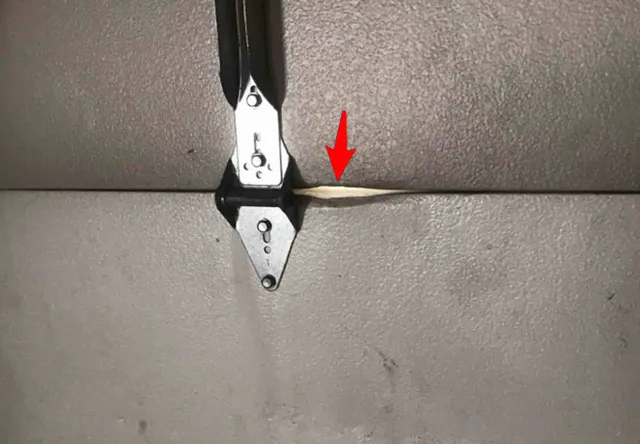Cracked garage door panels: photo 2 from a Chicago inspection report