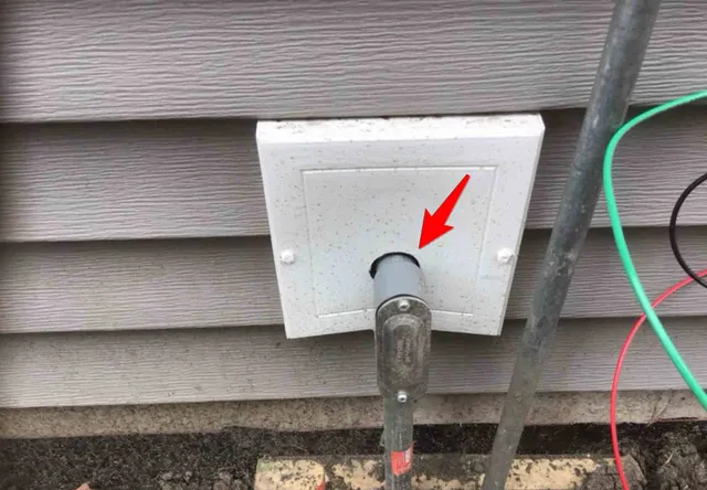Unsealed gap where conduit enters the garage: photo 1 from a Chicago inspection report