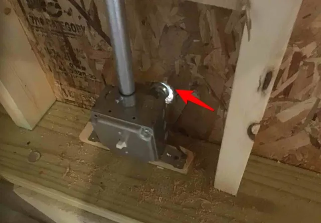 Unsealed gap where conduit enters the garage: photo 2 from a Chicago inspection report