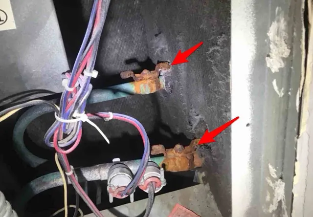 Rusting shut-off valves inside the HVAC units: photo 1 from a Chicago inspection report