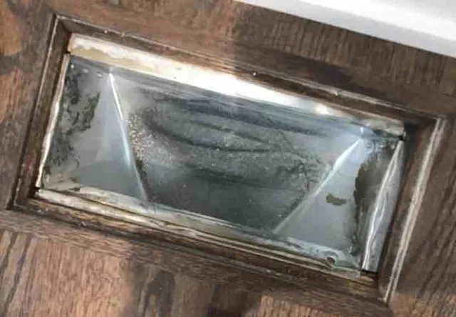 Construction debris in the floor vents: photo 2 from a Chicago inspection report