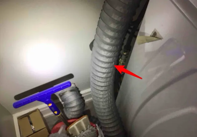 Plastic dryer duct (fire risk): photo 1 from a Chicago inspection report