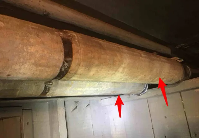 Possible asbestos pipe wrap: photo 2 from a Chicago inspection report