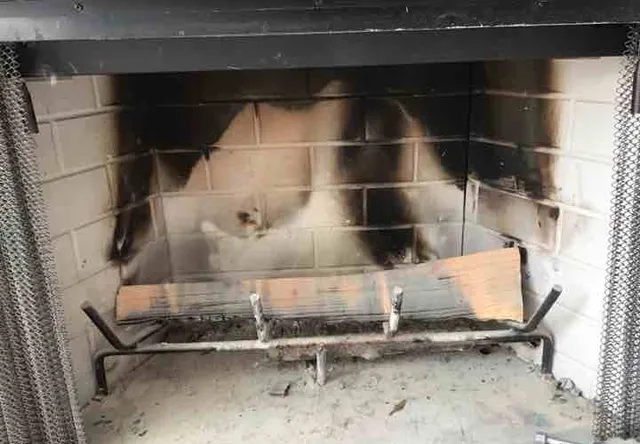 Gap around the gas line in the fireplace, soot in the flue: photo 1 from a Chicago inspection report