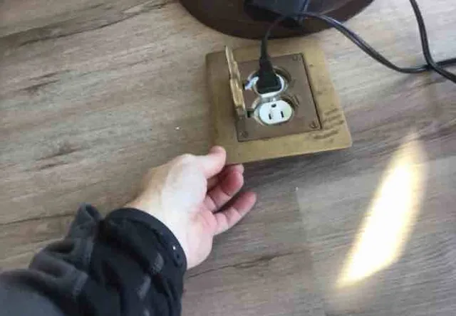 Loose floor outlet: photo 1 from a Chicago inspection report