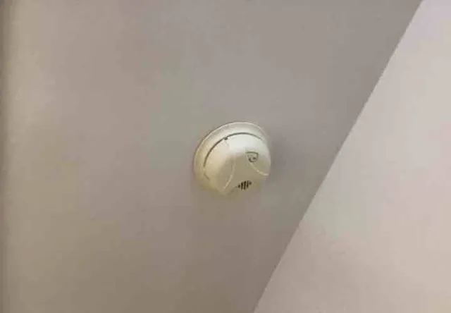 Old smoke and CO detectors, some missing: photo 1 from a Chicago inspection report