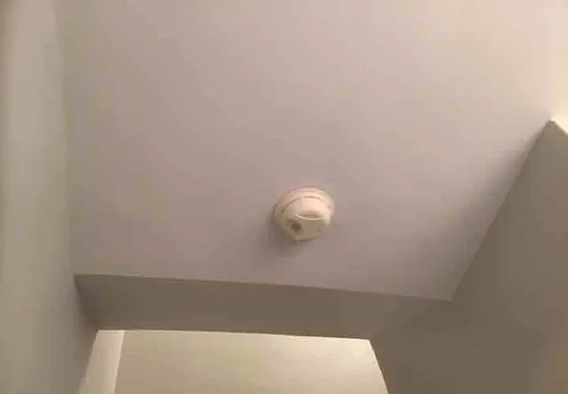 Old smoke and CO detectors, some missing: photo 2 from a Chicago inspection report