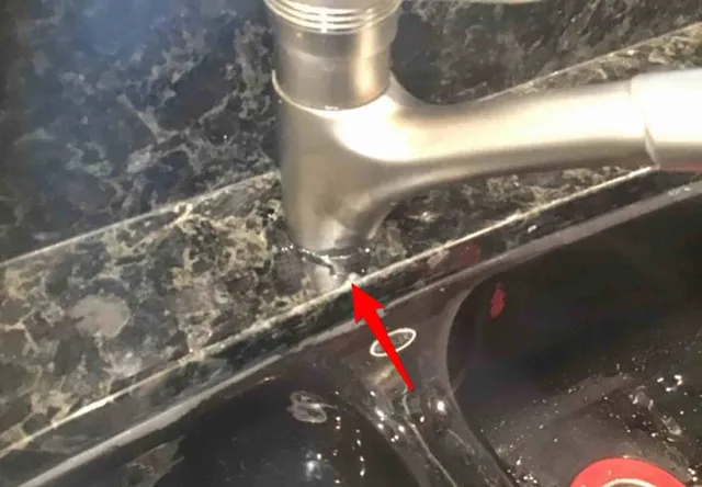 Faucet leaks at the base: photo 1 from a Chicago inspection report