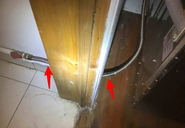 Flexible gas line run through a wall: photo 1 from a Chicago inspection report