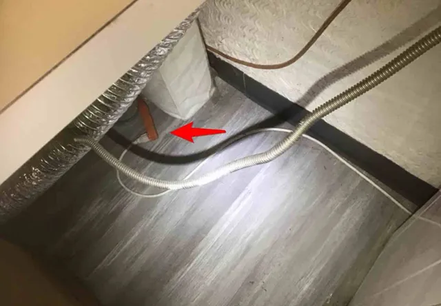 Washer running on an extension cord: photo 1 from a Chicago inspection report