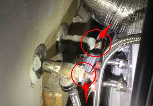Corroded washer shut-off valves: photo 1 from a Chicago inspection report