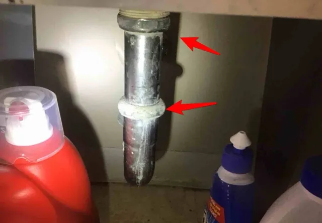 Corroded, previously leaking sink drain: photo 1 from a Chicago inspection report