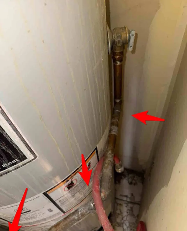Water heater relief pipe routed wrong: photo 1 from a Chicago inspection report