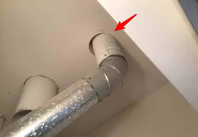 Water heater vent touching drywall (fire risk): photo 1 from a Chicago inspection report