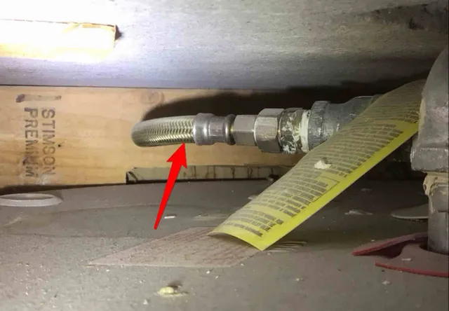 Wrong size and material on the relief pipe: photo 1 from a Chicago inspection report