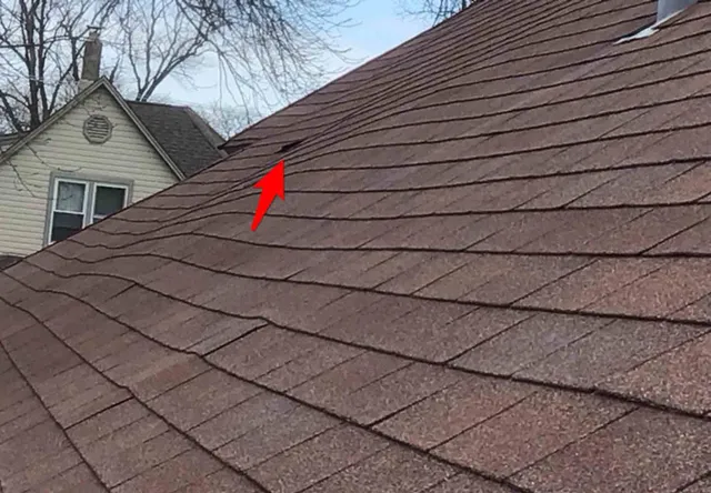 Lifted shingles: photo 1 from a Chicago inspection report