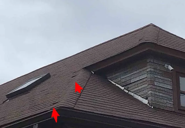Lifted shingles: photo 2 from a Chicago inspection report