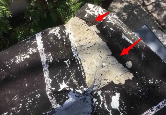 Cracked parapet walls and coping: photo 1 from a Chicago inspection report