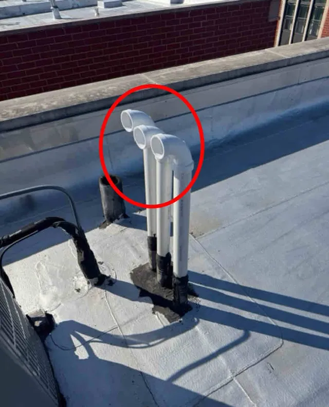 Exhaust flues too close to the furnace air intake: photo 1 from a Chicago inspection report